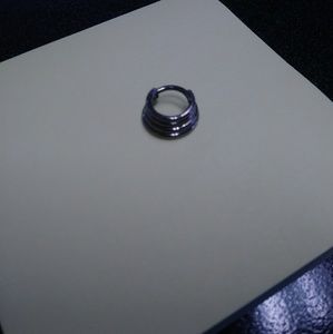 Titanium quadruple septum clicker by Zadamer.